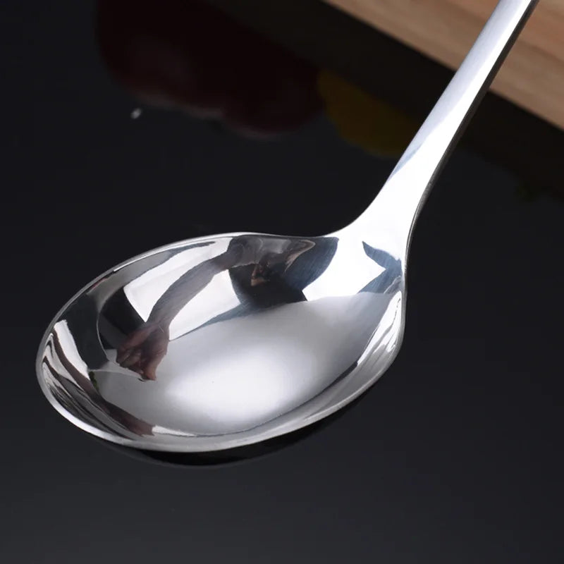 Cuchara coladora de acero inoxidable para ollas calientes